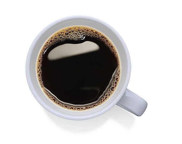 White cup filled with black coffee stock photo