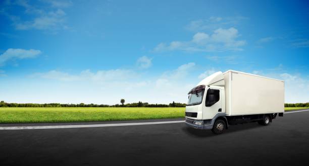 White Delivery Truck on the Road stock photo