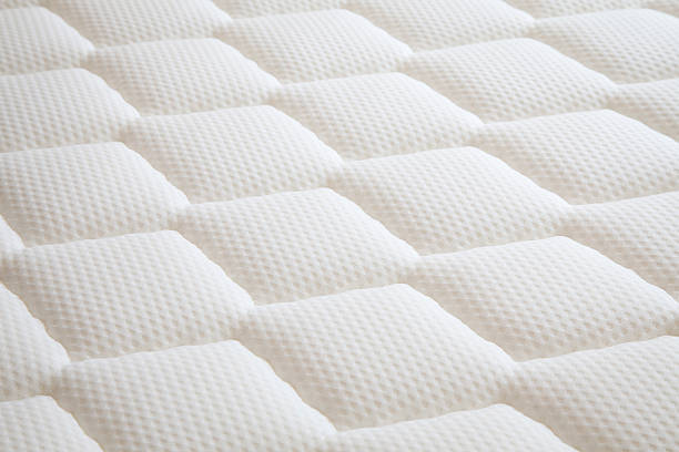 White diamond shaped mattress background stock photo