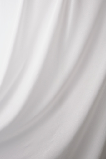 Elegant white drape textured background.