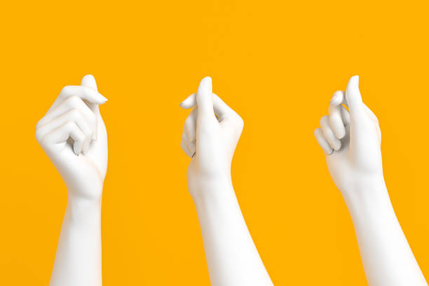 White female hand holding card, paper White female hand holding card, paper or something else isolated on yellow background, 3d rendering mannequin stock pictures, royalty-free photos & images