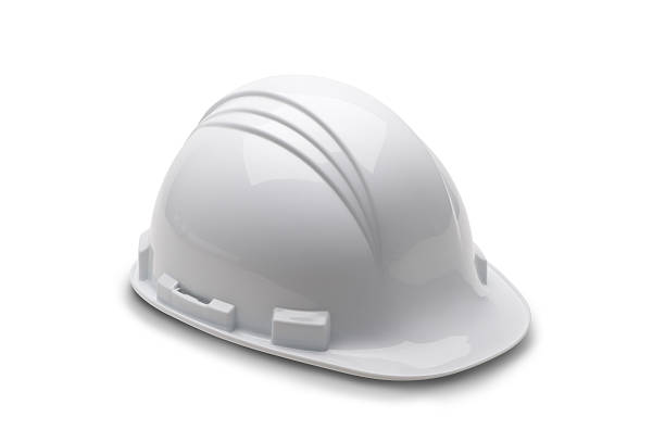 A white fire man's hard hat on a white background Hard hat isolated on white with shadow helmet stock pictures, royalty-free photos & images
