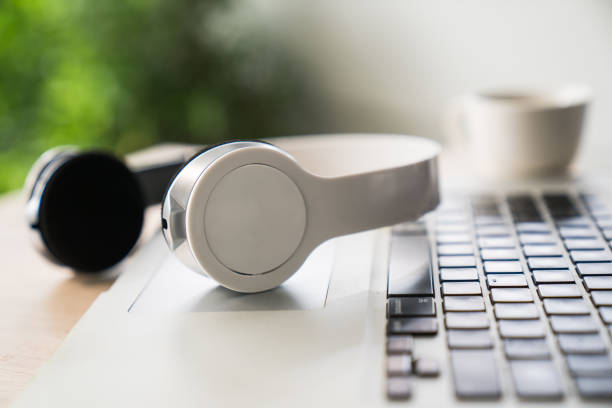 white headphones and laptop. stock photo