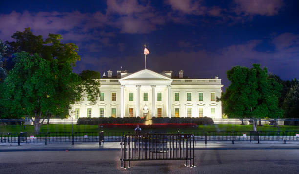White House September 12, 2017, Washington, DC, USA: The White House at night during the Trump Administration. donald trump stock pictures, royalty-free photos & images