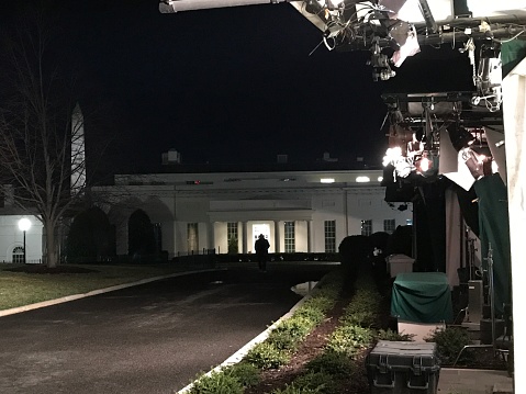 Washington DC,USA - Mar 22,2019:Night The presidential office seen from Pebble beach.West Wing with lighting equipment for relay and a presidential office to the west of the White House.