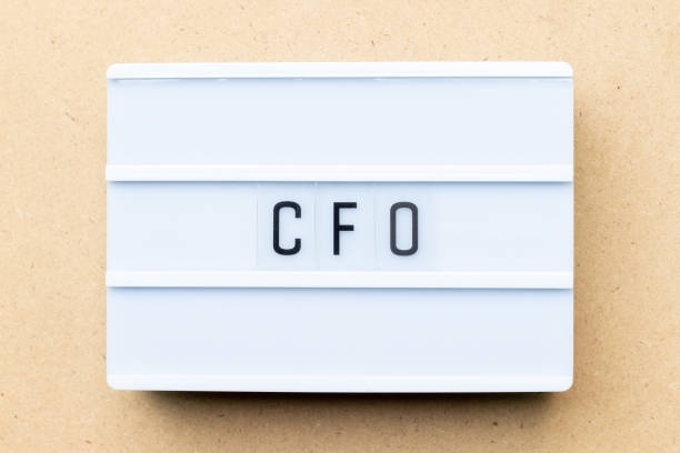 White lightbox with word CFO (Abbreviation of Chief Financial Officer) on wood background White lightbox with word CFO (Abbreviation of Chief Financial Officer) on wood background cfo stock pictures, royalty-free photos & images