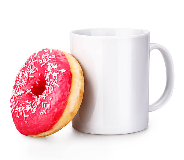 white mug donut stock photo