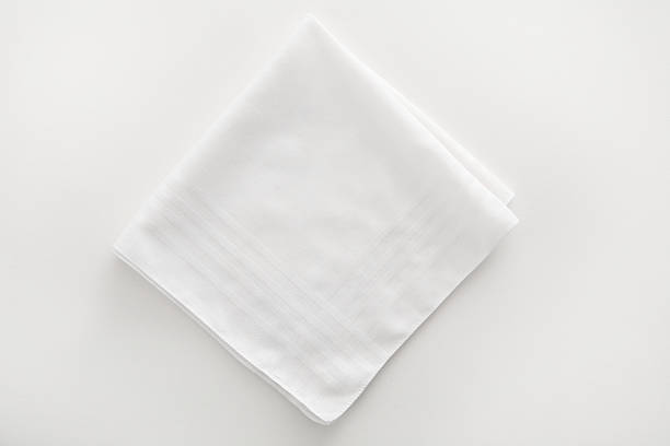White napkin cloth on white background white napkin, similar subject: napkin stock pictures, royalty-free photos & images
