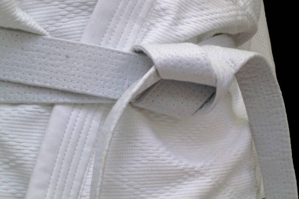 White obi sash Close-up on a white belt tied around a kimono. bushido lifestyle stock pictures, royalty-free photos & images