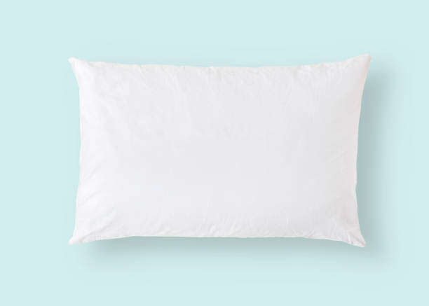 White pillow on blue background isolated with clipping path for bedding mockup design template  pillow stock pictures, royalty-free photos & images