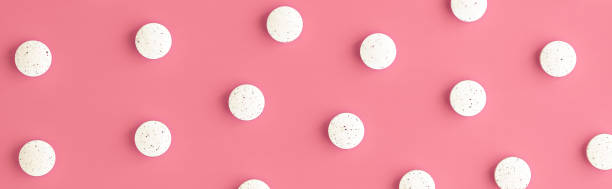 white pills banner. dietary supplement background. immune health care concept close-up stock photo