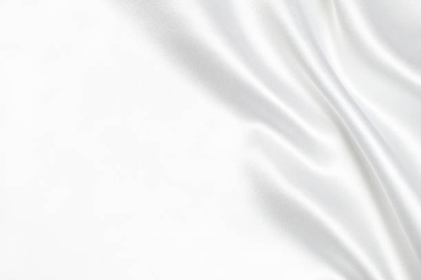 ホワイトのシルク素材の背景 - 布 ストックフォトと画像