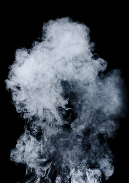 White smoke on black background stock photo
