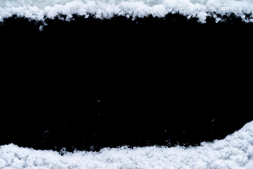 White snow borders isolated on black background