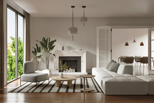 White sofa by coffee table and fireplace in contemporary living room at home. Render image