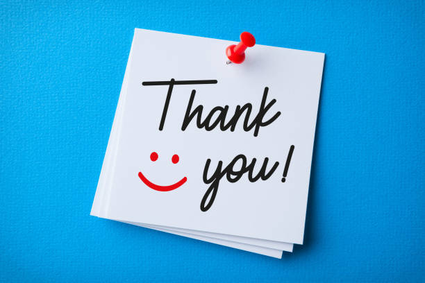 White Sticky Note With Thank You And Red Push Pin On Blue Background White Sticky Note With Thank You And Red Push Pin On Blue Background thank you stock pictures, royalty-free photos & images