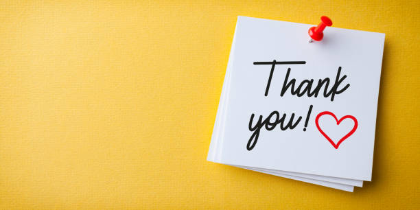 White Sticky Note With Thank You And Red Push Pin On Yellow Background White Sticky Note With Thank You And Red Push Pin On Yellow Background thank you phrase stock pictures, royalty-free photos & images