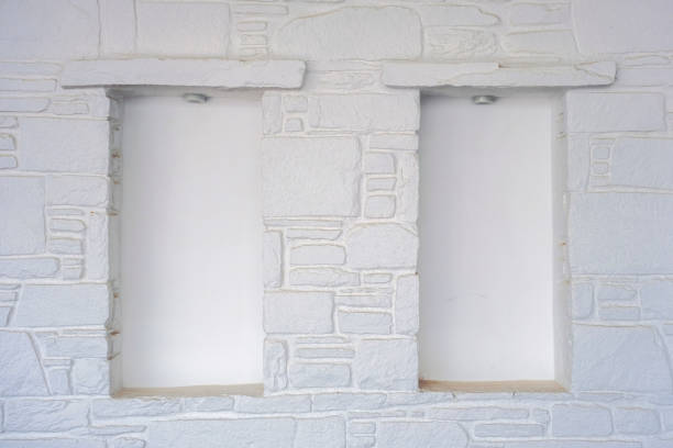 White stone wall with empty niche stock photo