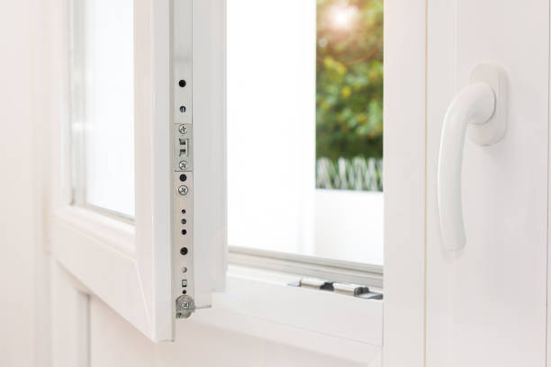 White strong modern window and balcony door - Home safety Secure anti-theft burglars-proof window locking mechanism – strong modern white PVC metal window symmetry stock pictures, royalty-free photos & images