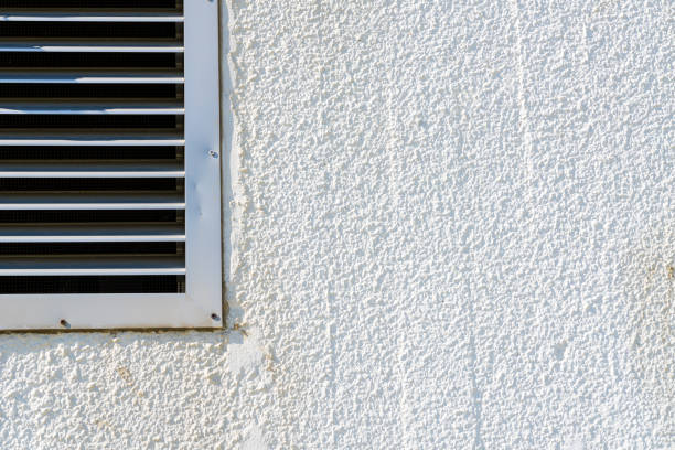 White stucco with air vent stock photo