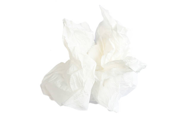 white tissue A white tissue on white background facial tissue stock pictures, royalty-free photos & images
