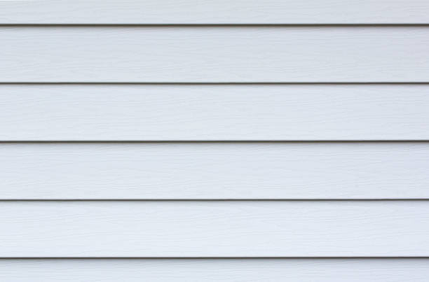 White Vinyl Siding Wall White Siding on Exterior of a Home shiplap stock pictures, royalty-free photos & images