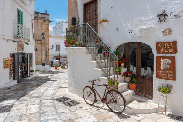 White wall in the city Ostuni, Apulia, southern Italy. stock photo