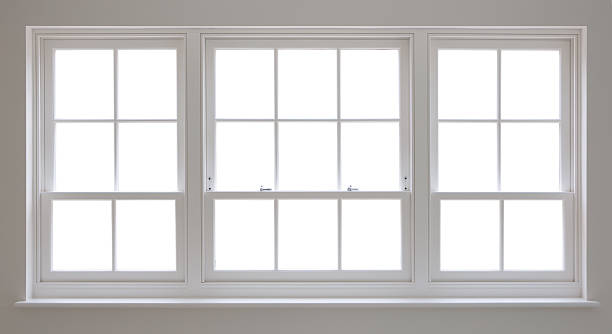 white wooden windows and clipping path a set of beautifully crafted white wooden windows with an isolated white background. A clipping path has been provided to enable you to place a background image of your choice. For best results, click on path, make a "selection" in Photoshop, expand the area by 1 pixel and feather by 0.5 pixels for a natural looking edge. Clear the white area and place your background image behind. window frame stock pictures, royalty-free photos & images