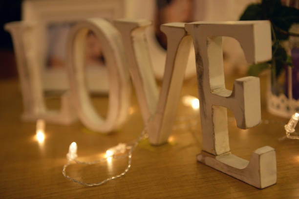 White wooden word love on the table. stock photo