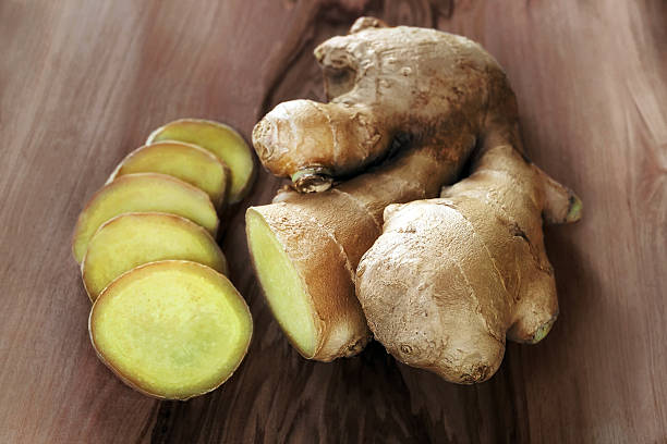 Whole ginger and sliced stock photo