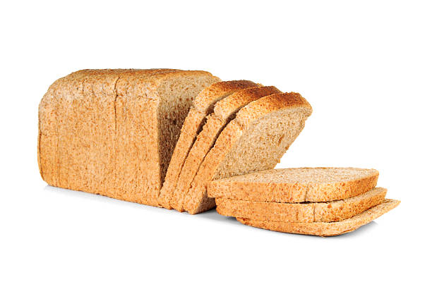 Whole wheat sliced bread Whole wheat sliced bread over white background 7 grain bread photos stock pictures, royalty-free photos & images