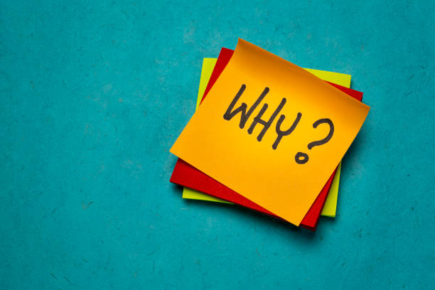 why question on a sticky note stock photo