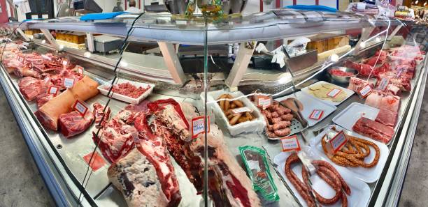 wide angle view of the butcher’s meat case at the mercato centrale firenze. stock photo