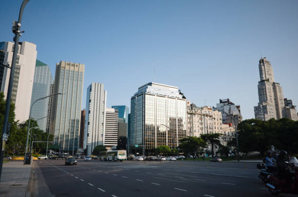 Wide avenue and view to commercial skyscrapers of financial center of the capital stock photo