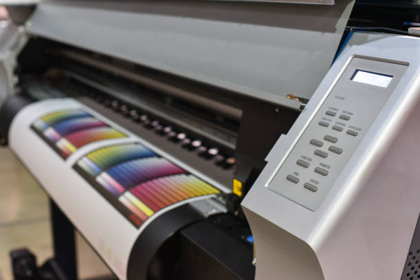 Wide format printer in work Wide format printer in work. Printing test image wide stock pictures, royalty-free photos & images