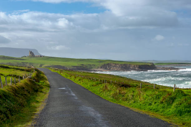 Wild Atlantic Way Wild Atlantic coastline at Mullaghmore head, Ireland. in The distance Classiebawn Castle can be seen. wild atlantic way stock pictures, royalty-free photos & images