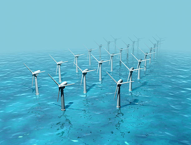 Wind farm on sea, electricity generation, green energy stock photo
