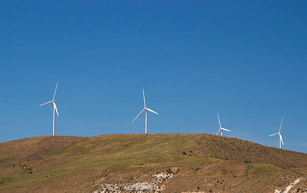 wind mills on the hill stock photo
