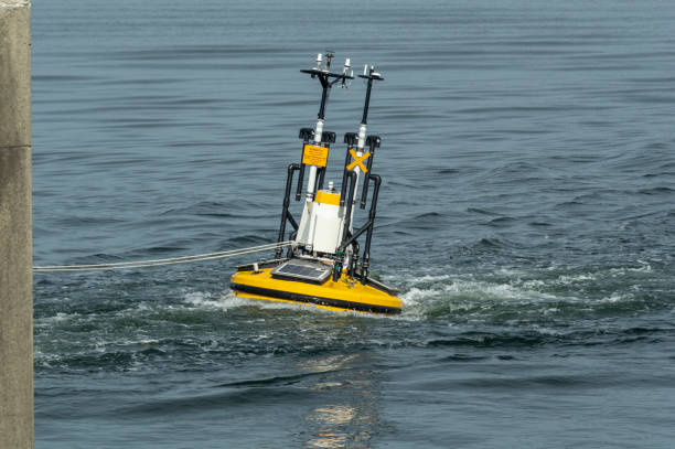Wind monitoring buoy under tow stock photo