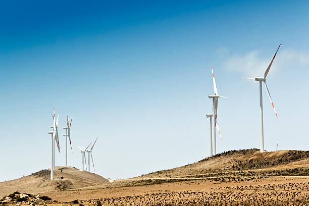 Wind turbine Wind farm in a desert. La Serena, Coquimbo, Chile. vertical axis wind turbine stock pictures, royalty-free photos & images