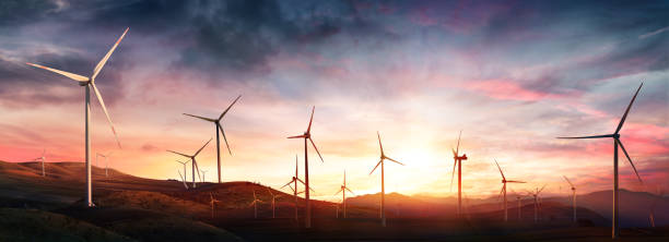vind turbiner i landsbygds landskapet vid solnedgången - wind turbine sunset bildbanksfoton och bilder