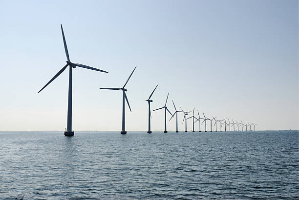 Wind turbines in the ocean outside Copenhagen, horizontal stock photo