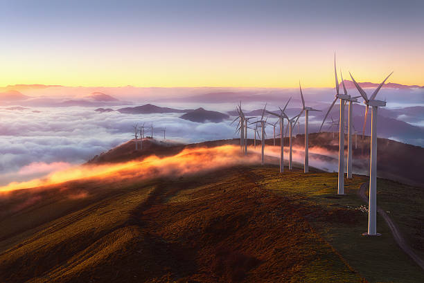 wind turbines wind turbines on the mountain wind power stock pictures, royalty-free photos & images