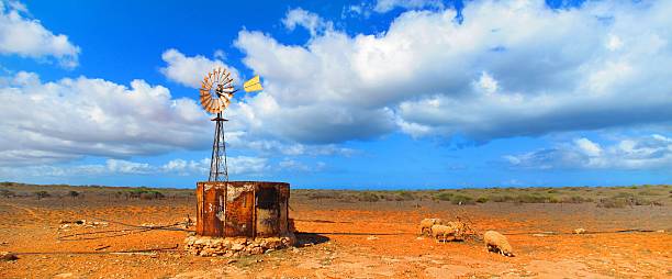 Windmill in the Outback, Coral Bay, Western Australia stock photo