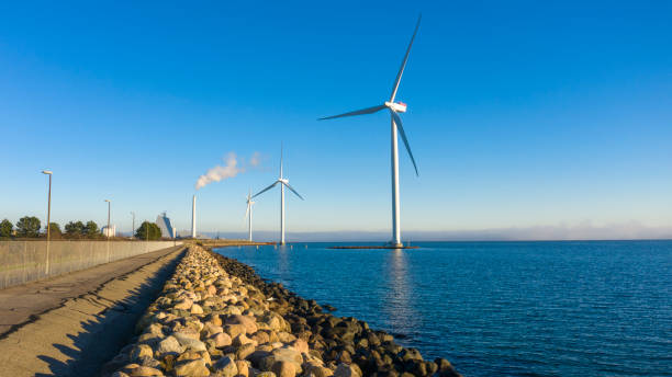 Windmills and Power Plant at Avedøreholmen Holme, just outside Copenhagen stock photo