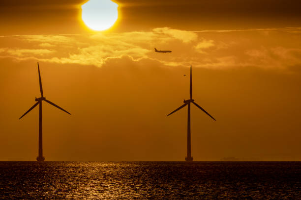 Windmills of shore stock photo