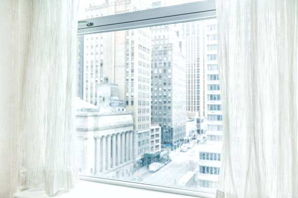 window blinds curtains with view looking at midtown new york city nyc cityscape skyline in manhattan hotel, apartment condo high rise building - window, inside apartment, new york imagens e fotografias de stock