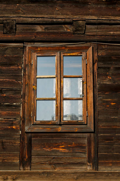 window of wooden house stock photo