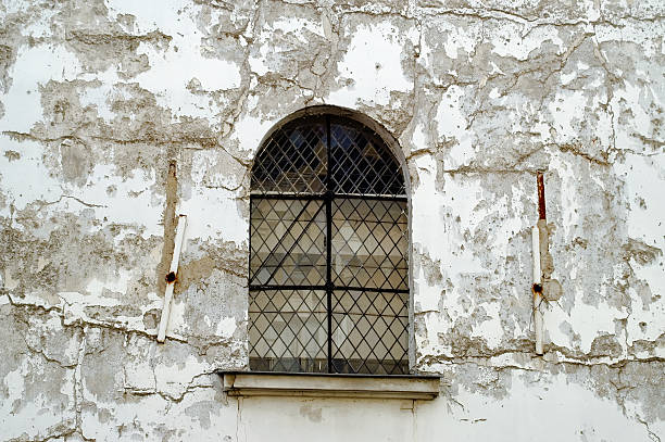 Window on an old wall stock photo