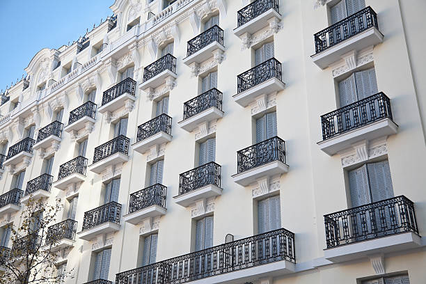 Windows facade of an apartment building Madrid, Spain stock photo